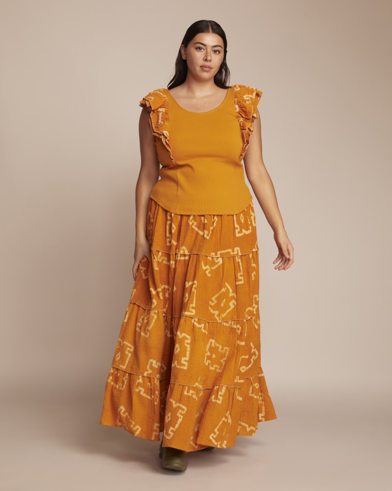 Front of a model wearing a size 2X Lidia Skirt in Tumeric by The Odells. | dia_product_style_image_id:230247